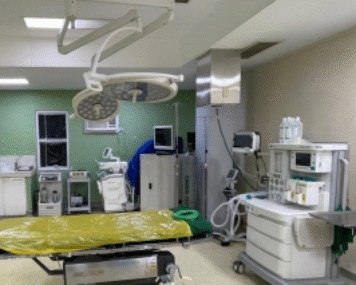 A sterile, specialized facility where surgical procedures are performed by trained medical teams using advanced equipment for patient care and recovery.